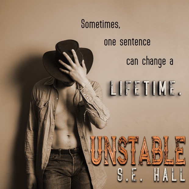 Sexy young cowboy with his shirt open