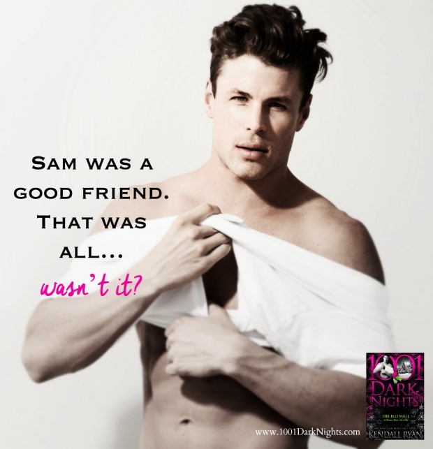 A handsome man with a good muscular build putting his shirt on